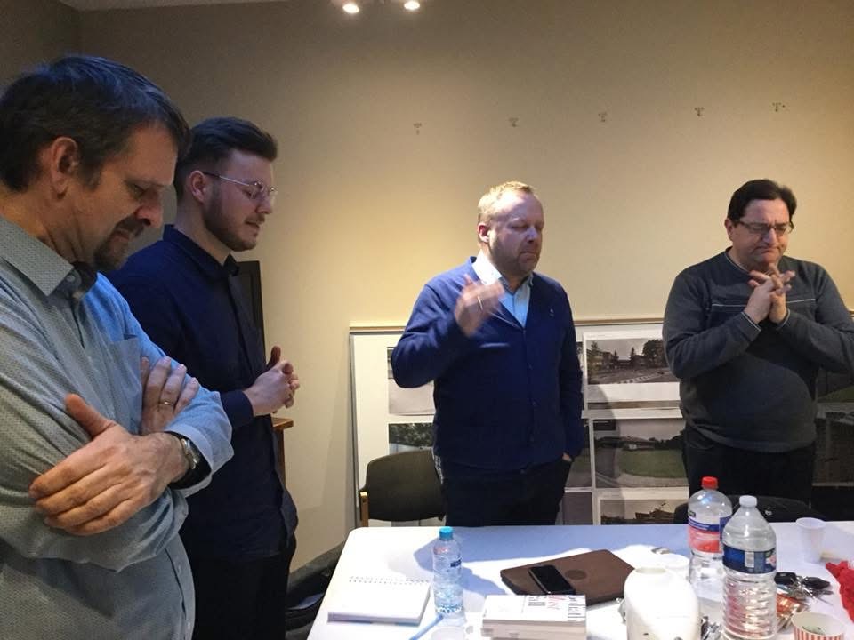 Men in prayer