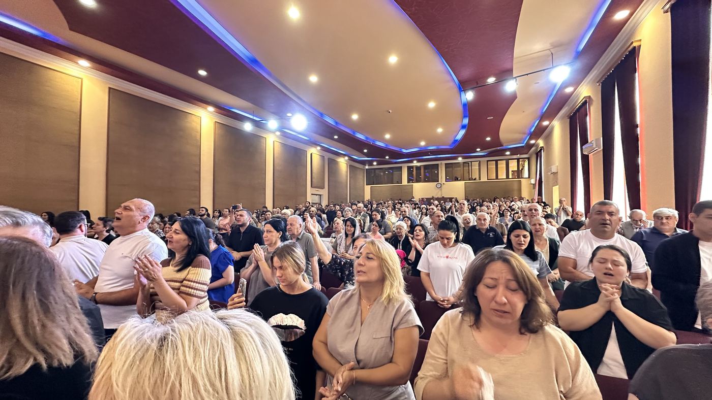 A full church hall in worship